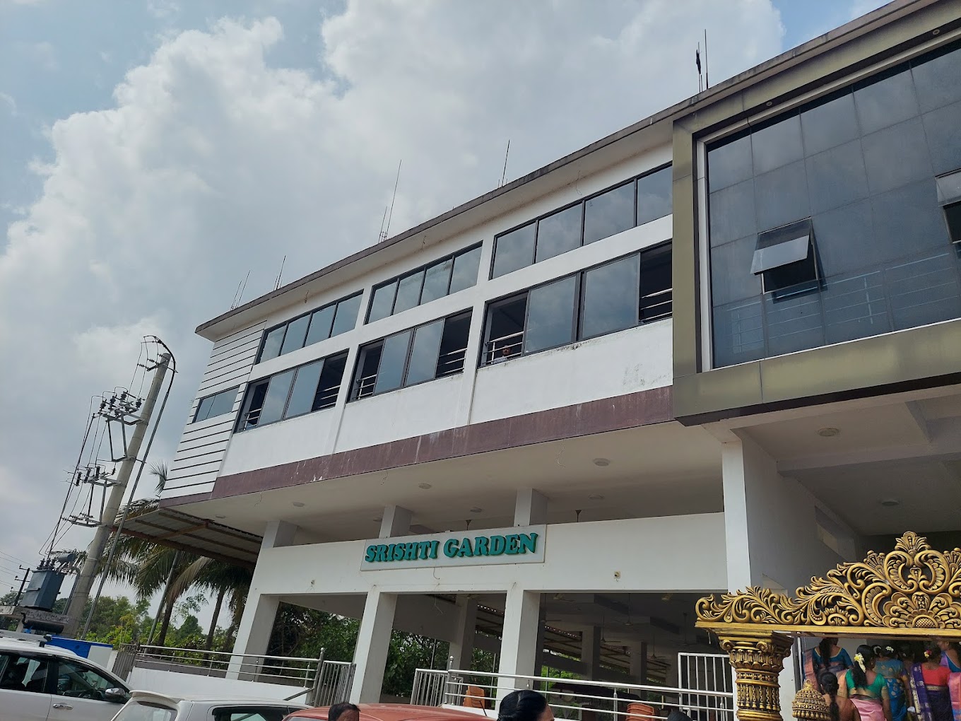 Venue entrance with Srishti Garden sign